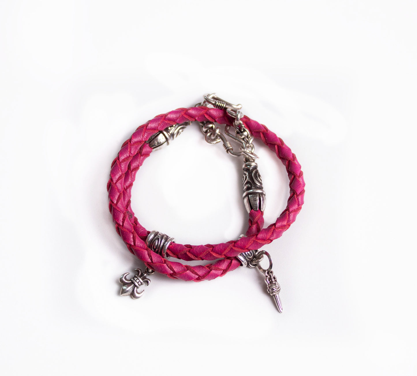 2 Spiral Terminals, 2 Links, 2 S-Clasps, 2 Pendant Pins, and 8 Rings, all made of solid 925 Sterling Silver & Genuine Leather Strap/Choker/Bracelet with 4 hand-braided strands.- PP02