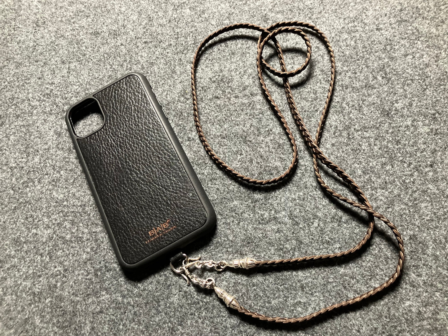 Full-Grain vegetable-tanned Genuine Leather iPhone Case/Holder/Microfiber. 2 Rope Terminals, 2 Links, 2-S clasps, and 6 Rings, all made of 925 Sterling Silver & Leather Crossbody/Necklace/Choker/Bracelet with 3 Hand-braided strands, Brown or Black.- KC14i