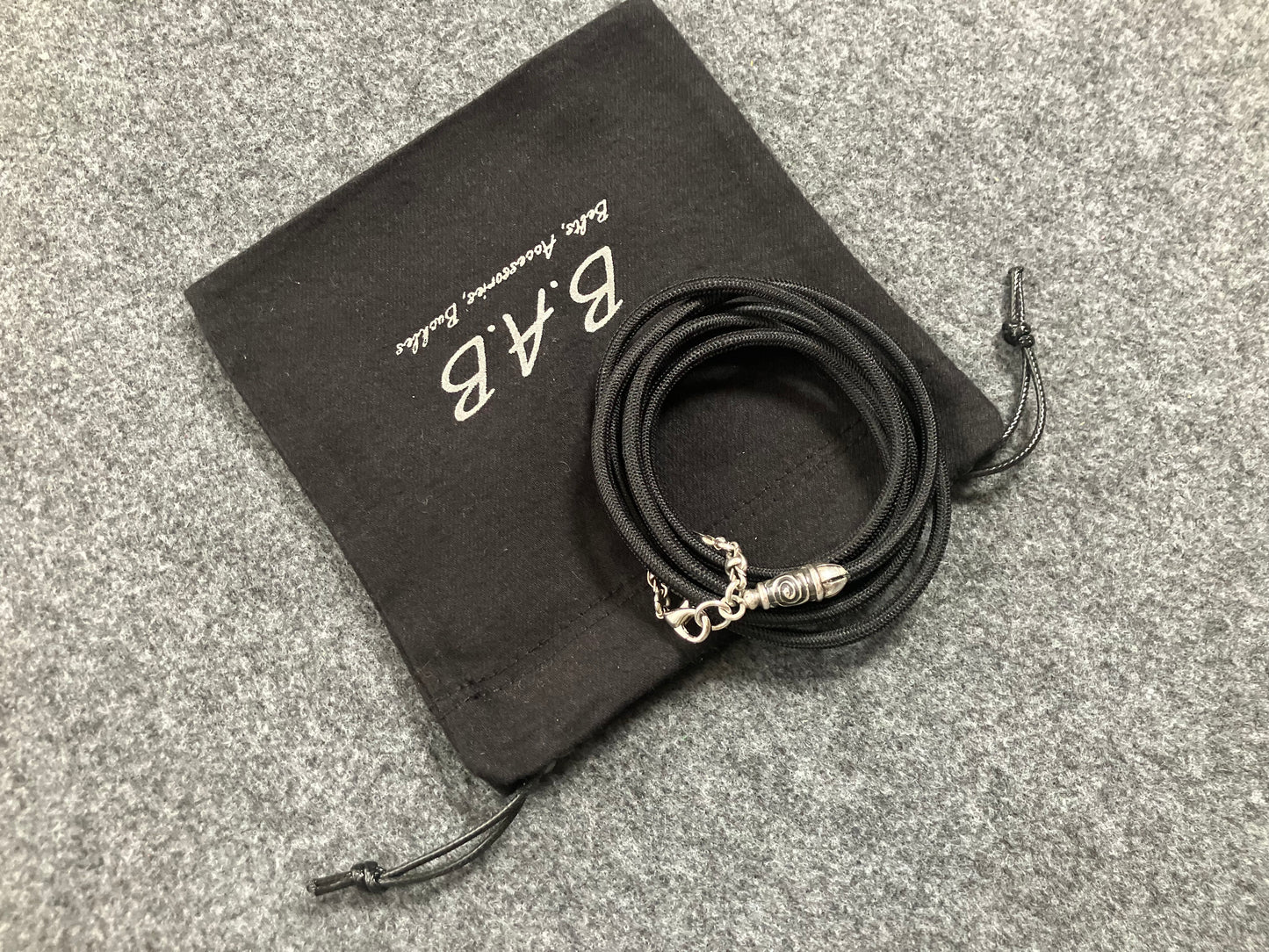 2 Spiral Terminals, 2 Links, and 6 Rings, all made of solid 925 Sterling Silver & Black Elastic Rope Crossbody/Necklace/Choker/Bracelet.- CP11