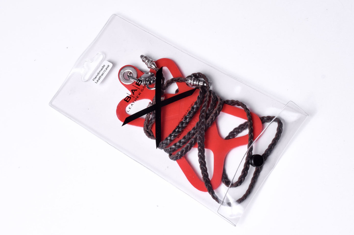 Laser-engraved Silicone cell phone Holder. 2 Skulls and 2 Rope Terminals, all made of solid 925 Sterling Silver & Genuine Leather Crossbody/Necklace/Bracelet with 3 hand-braided double strands, Brown, or Black.- SP30