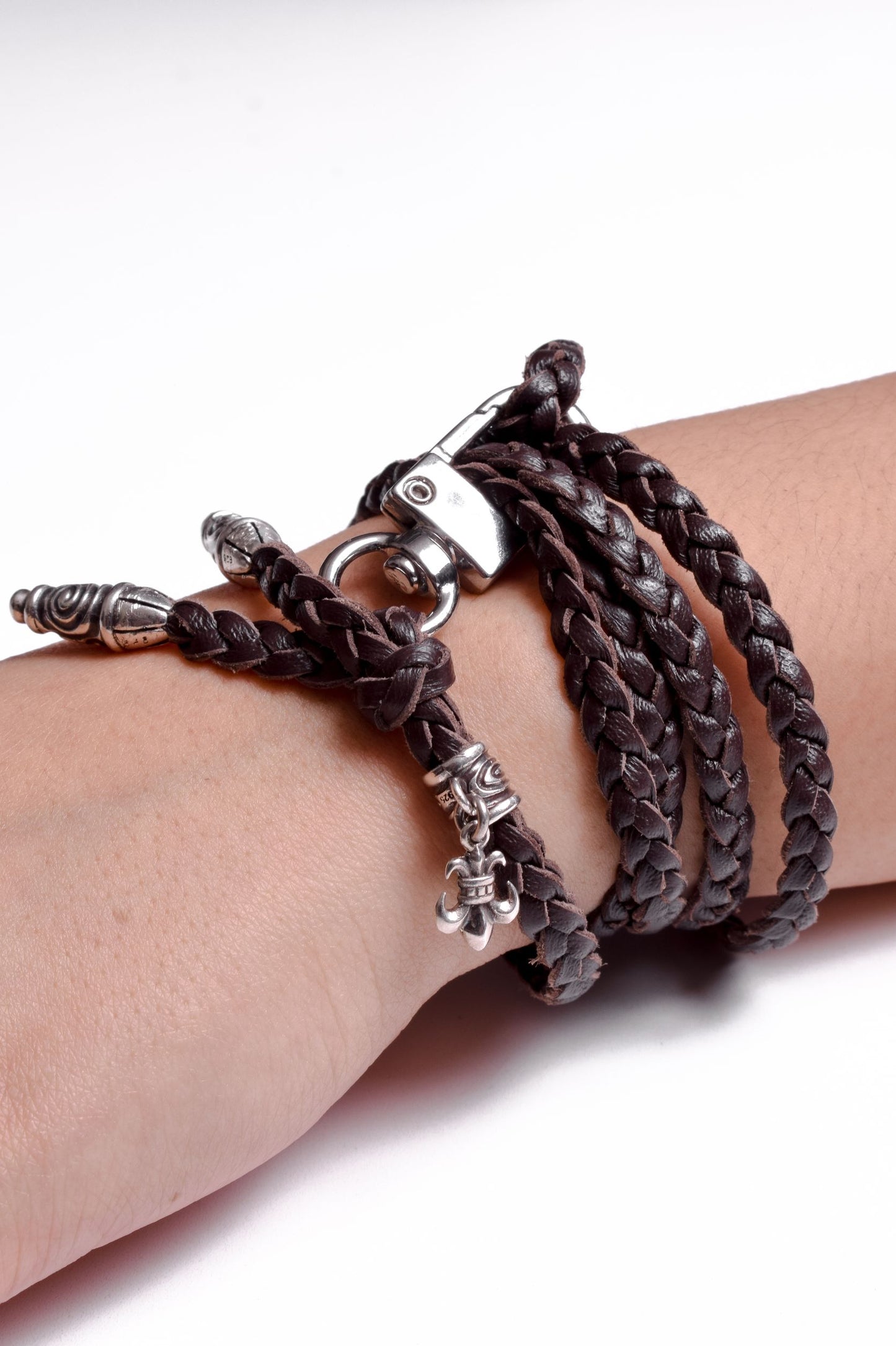 Laser-engraved Silicone cell phone Holder. 2 Spiral Terminals, 1 Spiral Pin with Ring, and 1 Fleur-de-Lys Pendant, all made of 925 Sterling Silver & Crossbody/Necklace/Bracelet with 3 hand-braided double strands, Brown, or Black.- SP45