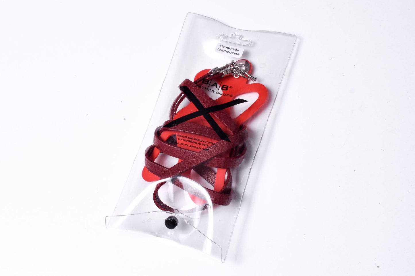 Laser-engraved Silicone cell phone Holder. 2 Cape Terminals, 1 Cane, and S-Clasp, all made of Solid 925 Sterling Silver & Crossbody/Necklace/Bracelet in double Full-Grain vegetable-tanned Leather, Blue, Brown, Black, or Red.- SP25