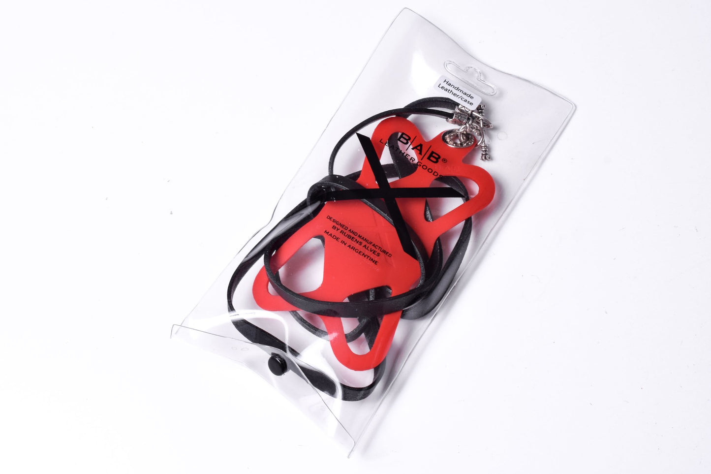 Laser-engraved Silicone cell phone Holder. 2 Cape Terminals, 1 Cane, and S-Clasp, all made of Solid 925 Sterling Silver & Crossbody/Necklace/Bracelet in double Full-Grain vegetable-tanned Leather, Blue, Brown, Black, or Red.- SP25