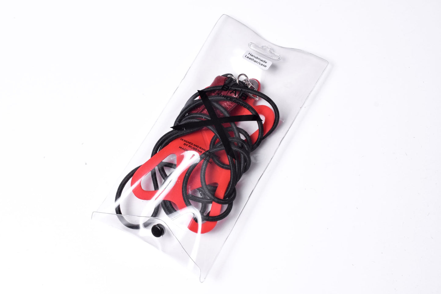Soporte para celular de Silicona grabado con láser. Crossbody/Collar/Pulsera doble de Cuerda Elástica Negra & 2 Terminales de Cuero Full-Grain curtido vegetal al tanino, Azul, Marrón, Negro o Rojo con 2 Mosquetones plateados.- S23