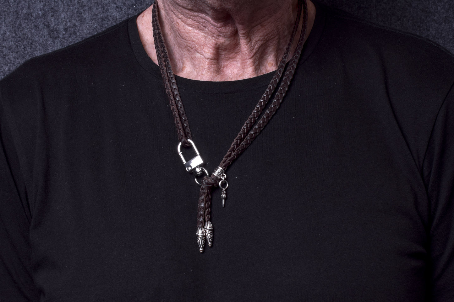 Laser-engraved Silicone cell phone Holder. 2 Spiral Terminals, 1 Spiral Pin with Ring, and 1 Dagger Pendant, all made of solid 925 Sterling Silver & Genuine Leather Crossbody/Necklace/Bracelet with 3 hand-braided double strands, Brown, or Black.- SP32
