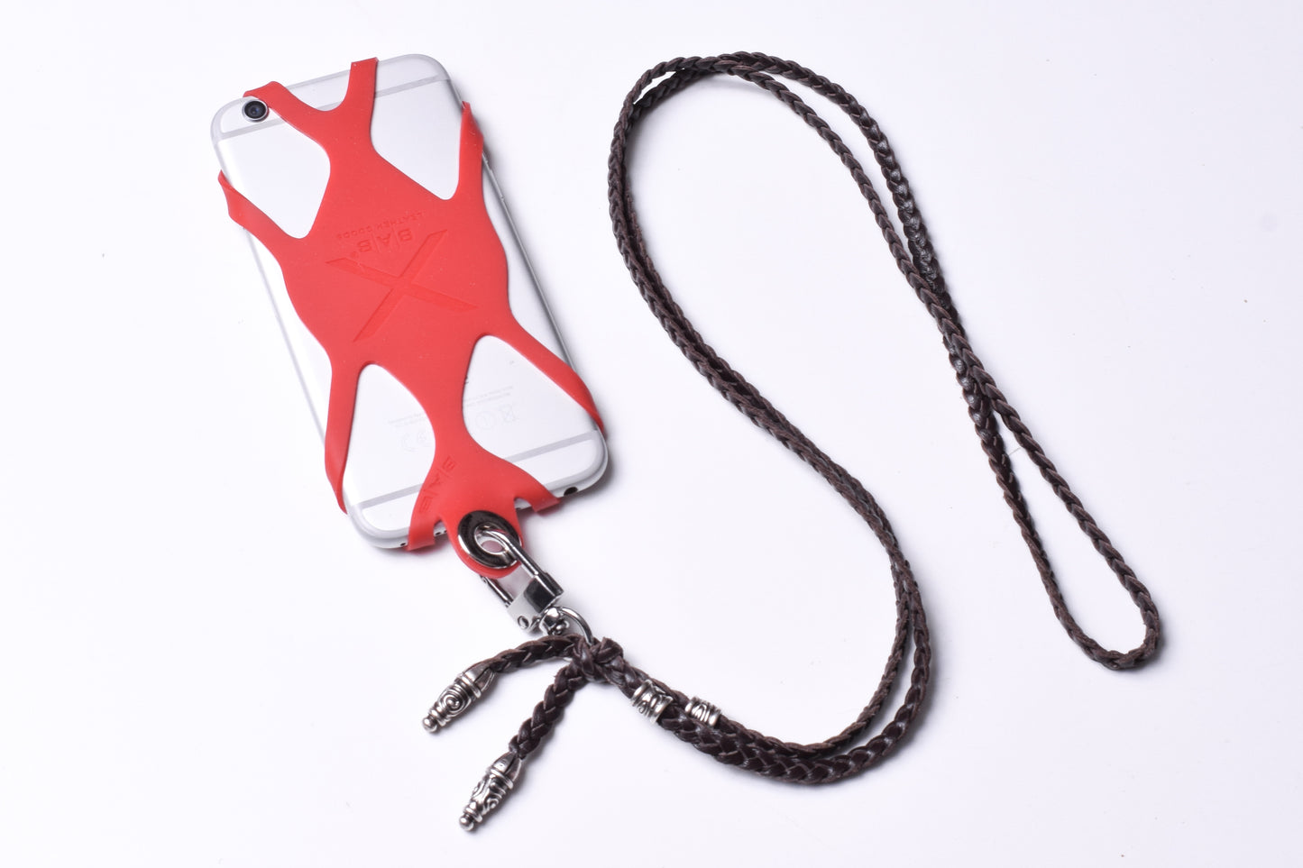 Laser-engraved Silicone cell phone Holder. 2 Spiral Terminals and 2 Spiral Pins, all made of solid 925 Sterling Silver & Genuine Leather Crossbody/Necklace/Bracelet with 3 hand-braided double strands, Brown, or Black.- SP43