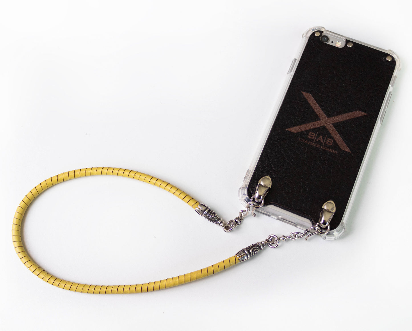 Full-Grain vegetable-tanned Genuine Leather iPhone Case. 2 Spiral terminals, 2 Links, 2 S-clasps, and 6 Rings, all made of 925 Sterling Silver & Hand-braided Yellow Genuine Leather Spiral Strap/Choker/Bracelet.- F01