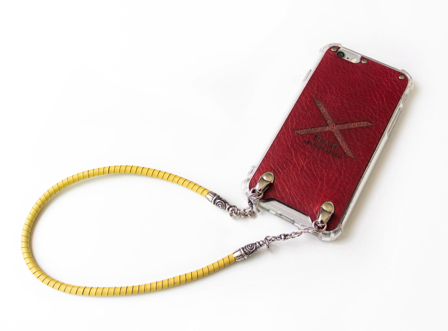 Full-Grain vegetable-tanned Genuine Leather iPhone Case. 2 Spiral terminals, 2 Links, 2 S-clasps, and 6 Rings, all made of 925 Sterling Silver & Hand-braided Yellow Genuine Leather Spiral Strap/Choker/Bracelet.- F01