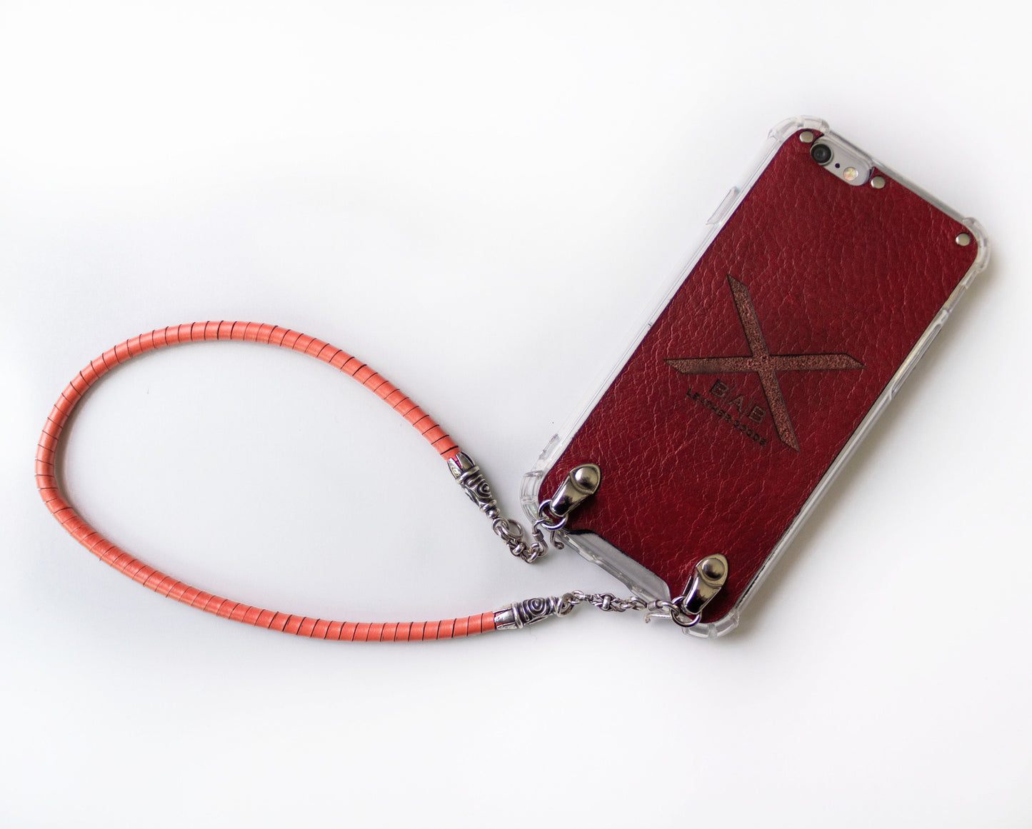 Full-Grain vegetable-tanned Genuine Leather iPhone Case. 2 Spiral terminals, 2 Links, 2 S-clasps, and 6 Rings, all made of 925 Sterling Silver & Hand-braided Orange Genuine Leather Spiral Strap/Choker/Bracelet.- F01