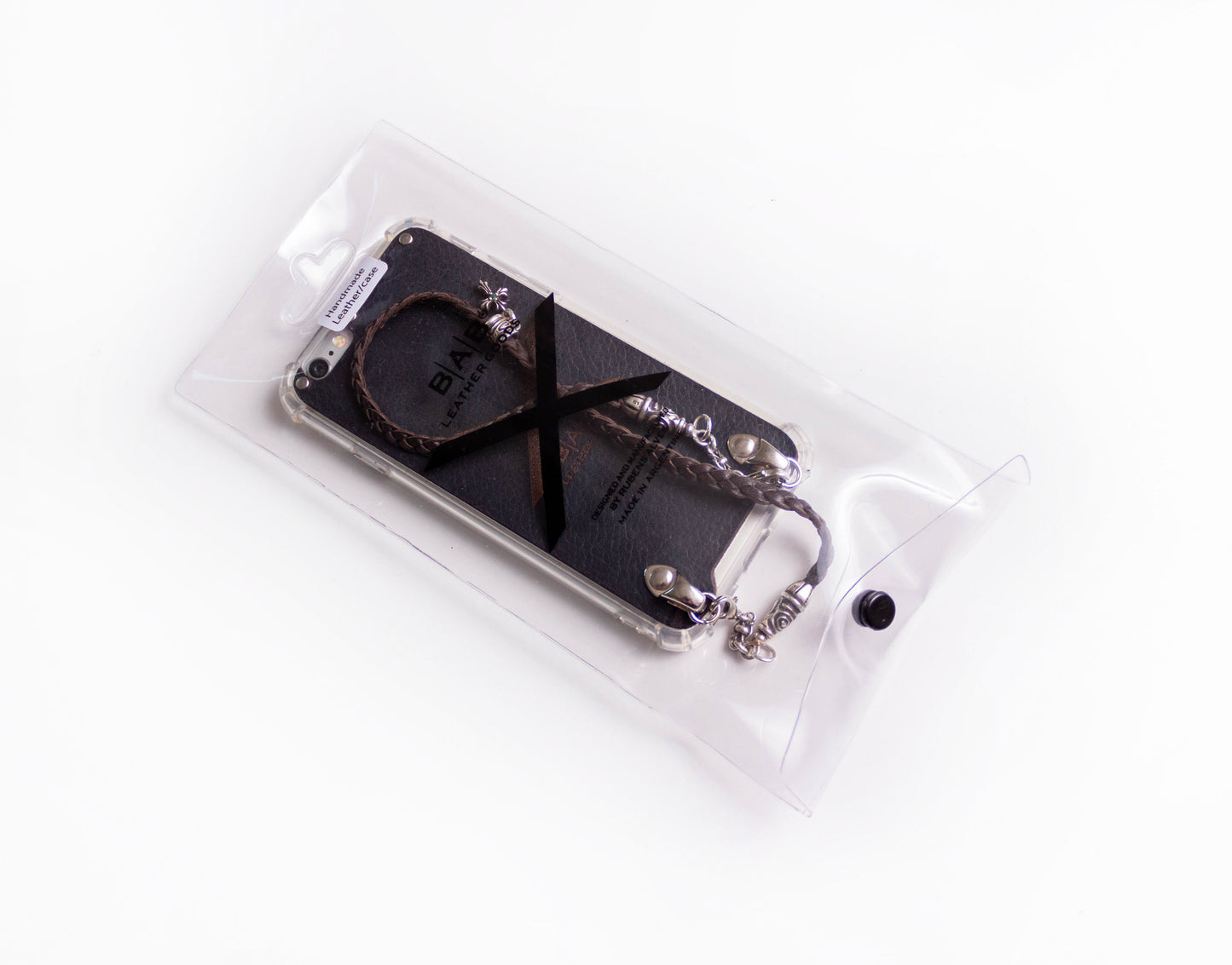 Leather iPhone Case/Microfiber. 2 Spiral Terminals, 1 Spiral Pin with Ring, 2 Links, and 1 Crucifix Pendant with 2 Emeralds and 6 Rings, all made of 925 Silver & Strap/Choker/Bracelet 3 hand-braided double strands Brown or Black.- F24