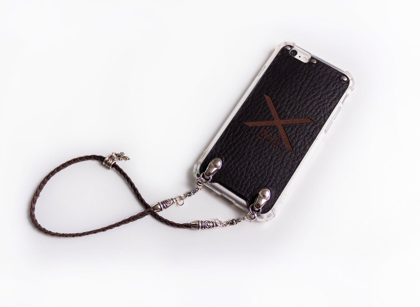 Leather iPhone Case/Microfiber. 2 Spiral Terminals, 1 Spiral Pin with Ring, 2 Links, and 1 Crucifix Pendant with 2 Emeralds and 6 Rings, all made of 925 Silver & Strap/Choker/Bracelet 3 hand-braided double strands Brown or Black.- F24