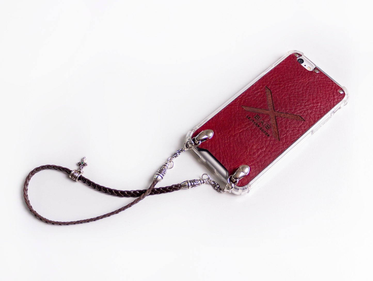 Leather iPhone Case/Microfiber. 2 Spiral Terminals, 1 Spiral Pin with Ring, 2 Links, and 1 Crucifix Pendant with 2 Emeralds and 6 Rings, all made of 925 Silver & Strap/Choker/Bracelet 3 hand-braided double strands Brown or Black.- F24
