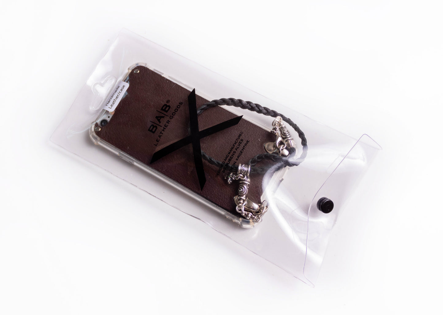 Leather iPhone Case/Microfiber. 2 Spiral Terminals, 1 Spiral Pin with Ring, 2 Links, and 1 Crucifix Pendant with 2 Emeralds and 6 Rings, all made of 925 Silver & Strap/Choker/Bracelet 3 hand-braided double strands Brown or Black.- F24