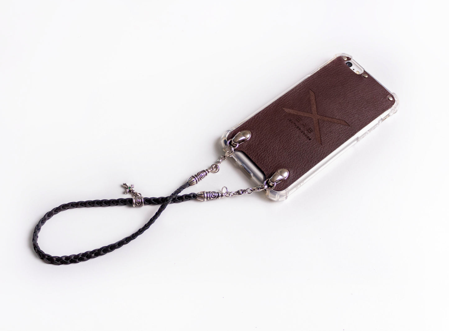 Leather iPhone Case/Microfiber. 2 Spiral Terminals, 1 Spiral Pin with Ring, 2 Links, and 1 Crucifix Pendant with 2 Emeralds and 6 Rings, all made of 925 Silver & Strap/Choker/Bracelet 3 hand-braided double strands Brown or Black.- F24