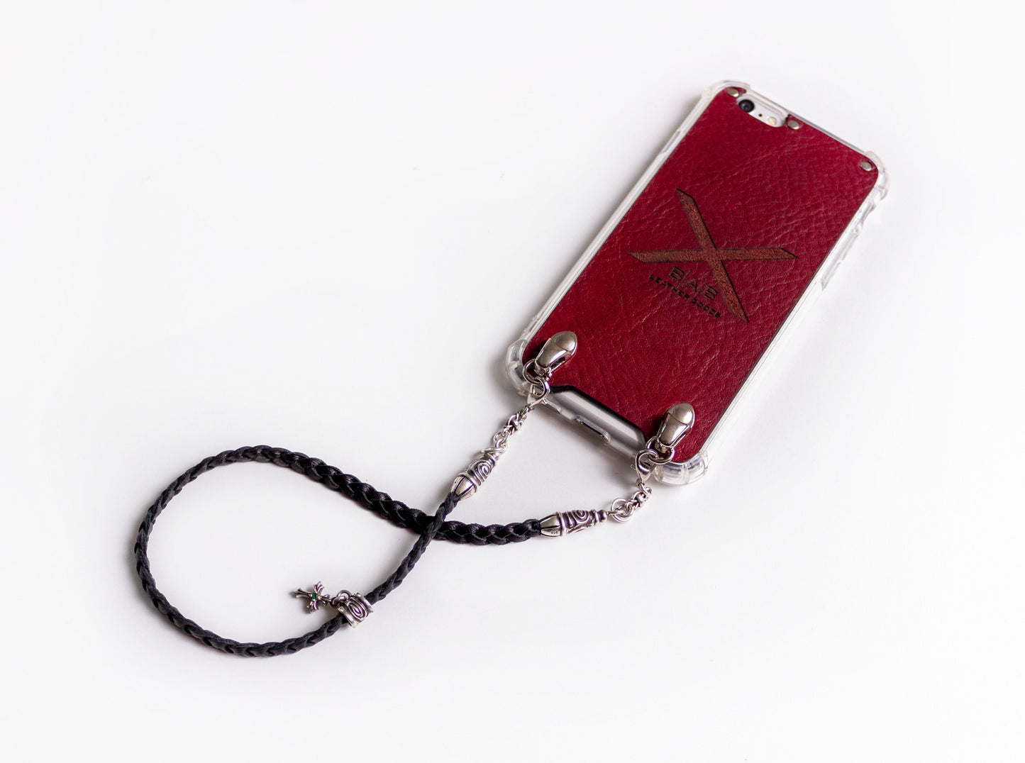 Leather iPhone Case/Microfiber. 2 Spiral Terminals, 1 Spiral Pin with Ring, 2 Links, and 1 Crucifix Pendant with 2 Emeralds and 6 Rings, all made of 925 Silver & Strap/Choker/Bracelet 3 hand-braided double strands Brown or Black.- F24