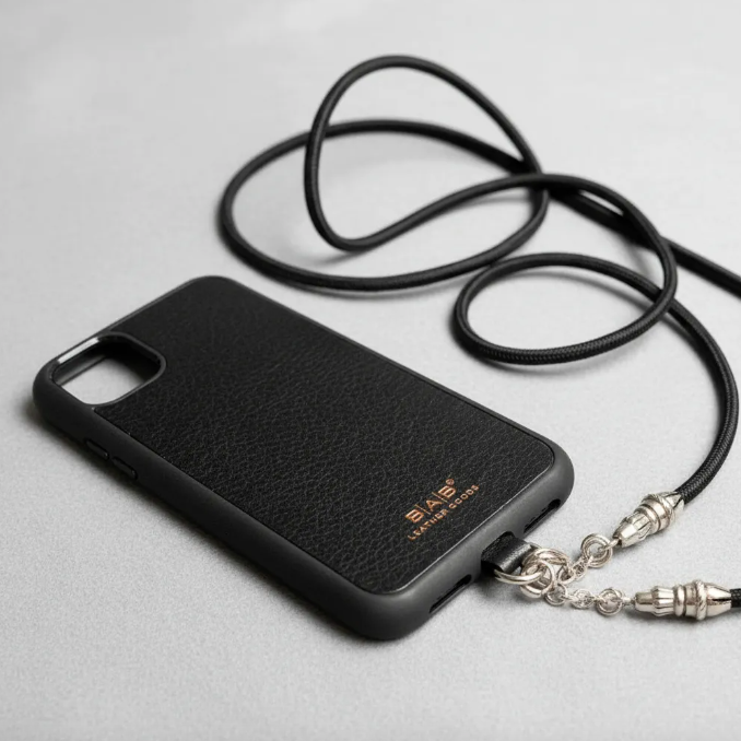 Funda/Soporte de Cuero Genuino Full-Grain curtido vegetal al tanino para iPhone/microfibra. 2 Terminales Cuerda, 2 Eslabones y 6 Argollas, todos de Plata Esterlina 925 & Crossbody/Collar/Gargantilla/Pulsera de Cuerda Elástica Negra.- KC29i